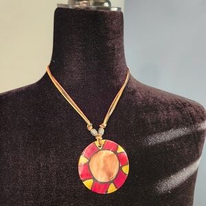 Beautiful enamel painted shell necklace.